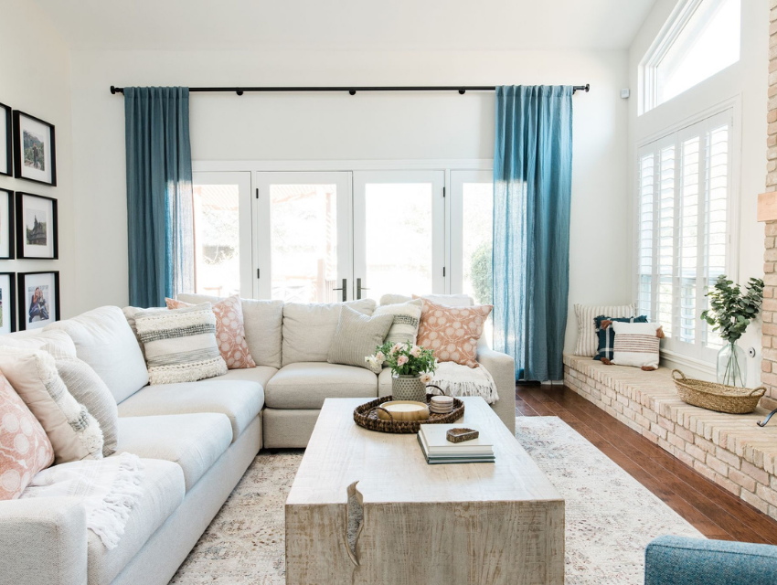 living room interior design blue drpaery white sofa wood coffee table built-in nook styleberry creative san antonio
