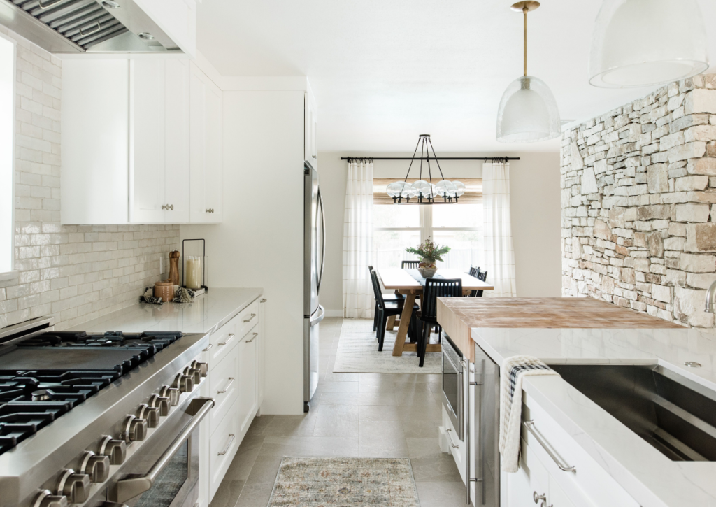 white modern rustic kitchen renovation design natural stone accent wall butchers block