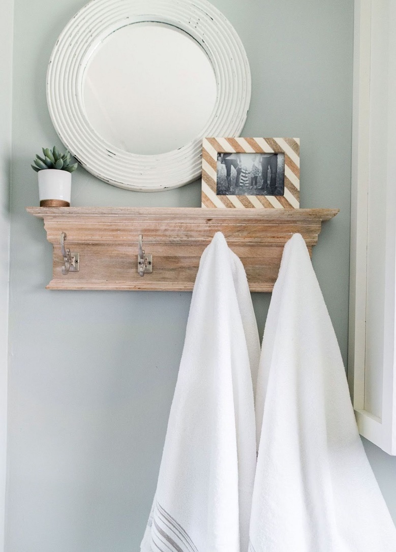 simple bathroom styling tips styleberry creative interiors san antonio texas shelf with framed photo mirror plant