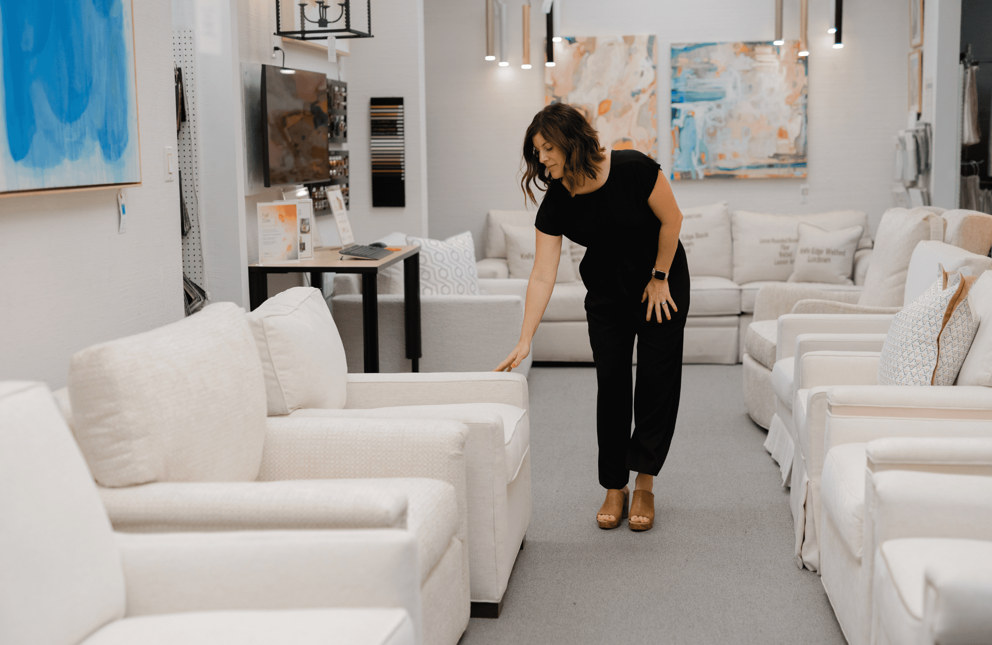home-furnishings-interior-design-hunters-creek-tx-inside-our-designer-showroom-shawna-percival-sit-testing-chairs-in-chair-gallery-fresh