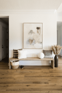 interior-designer-inwood-tx-textured-transitional-home-reveal-entryway-bench-styled-with-soft-comfortable-accessories-large-scale-abstract-painting-light-home-furnishing
