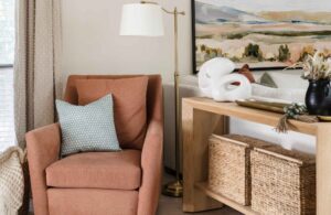 home-renovation-harvest-hills-tx-mixing-and-matching-our-design-services-sitting-area-with-upholstered-chair-and-console-table-with-storage-light